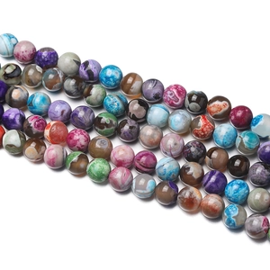 Macro shot of 8mm multi-color dragon vein agate loose beads for jewelry making