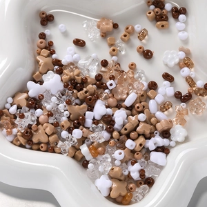 Mixed shape acrylic beads in earth tones for handmade DIY jewelry crafting and design