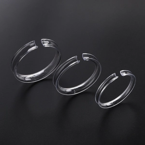 Three-piece clear acrylic ring size adjusters in various widths for loose ring fitting