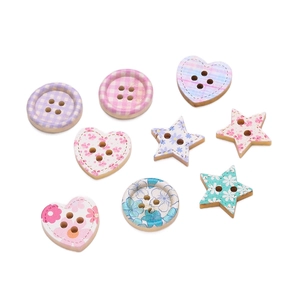 Macro detail of colorful wooden buttons with floral and plaid prints in various shapes