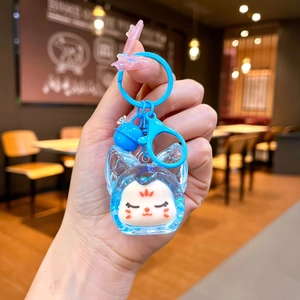 Porte-clés chat en acrylique bleu avec fermoir mousqueton et clochette assortie