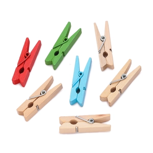 Detailed view of colorful and natural wood clips with strong metal spring structure