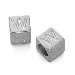 Macro view of 7mm stainless steel silver cube beads with engraved letter W for jewelry