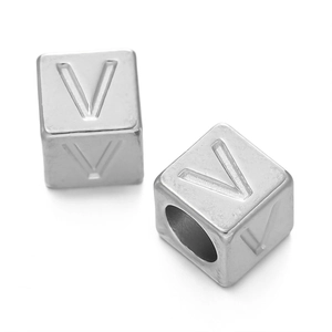 Macro shot of 7mm stainless steel cube bead with engraved letter V for DIY jewelry