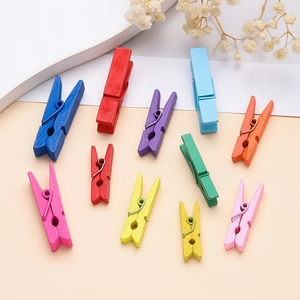 Colorful wooden photo clips with metal springs for DIY crafts and wall decoration