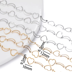 Macro detail of gold and silver heart-moon link chain with precise size dimensions