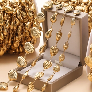 Detail of gold-plated shell and teardrop link chain for DIY jewelry making material