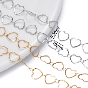 Macro view of gold and silver stainless steel heart link chains with 10mm size markings