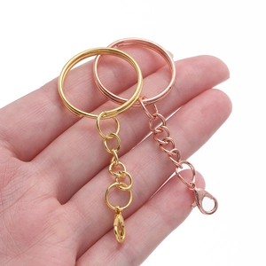 Polished metal keychain set with split ring and lobster clasp in gold and rose gold