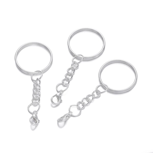 Three polished silver lobster clasps with flat split rings for DIY keychain crafting
