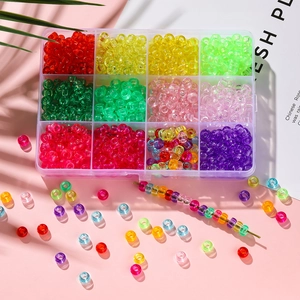 Lot de perles en acrylique 4x7mm colorées dans une boîte à 12 cases pour bijoux DIY