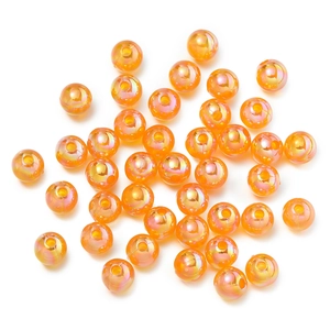 Close-up of translucent orange AB color acrylic round beads for DIY jewelry making