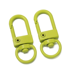 Close-up of dual bright green 32mm lacquered alloy swivel clasps with 360-degree rotation