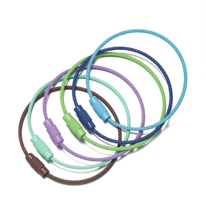 Detail of colorful plastic-coated wire keychains with screw connectors in candy colors