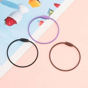 Detail of colorful steel wire keychains with secure screw lock mechanisms