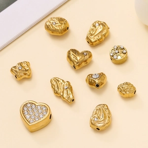 Perles d'espacement dorées en acier inoxydable avec motifs cœur pour bijoux DIY