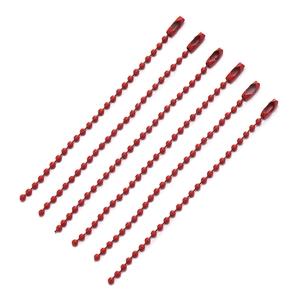 Detailed view of red metal bead chains with secure cylindrical connectors for DIY crafts