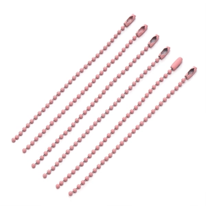 Detail of pink metal bead chains with matching connectors for DIY keychains and jewelry