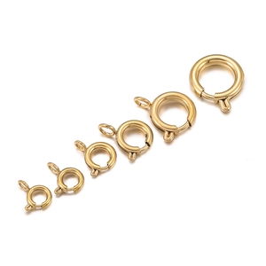 Detail view of six sizes of golden spring ring clasps for necklace and bracelet making