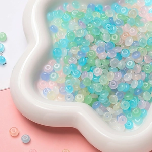 Macro detail of translucent pastel glass abacus beads for DIY jewelry making