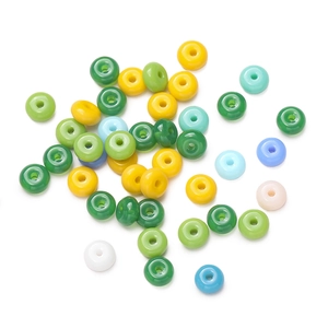 Macro shot of 3x6.5mm colorful glass abacus beads with precise 1.5mm holes for DIY jewelry