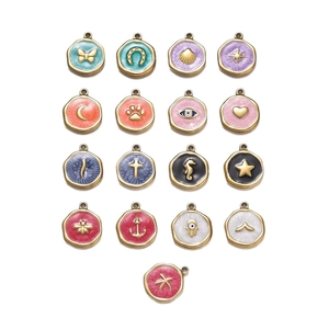 Variety of enamel stainless steel charms including butterfly and sea life designs for DIY jewelry
