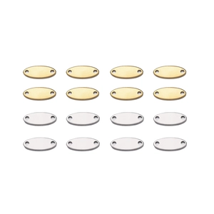 Detailed view of oval stainless steel jewelry tags with double holes in gold and silver