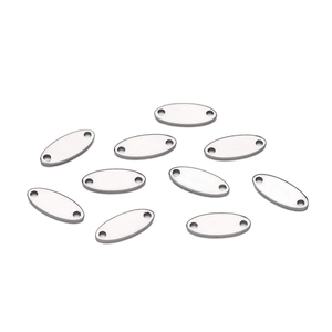 Close-up of ten oval stainless steel blank connectors with double holes for DIY jewelry