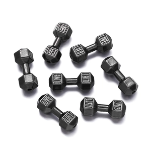 Macro shot of 7 gun-black dumbbell beads with engraved Live and Lift motivational text