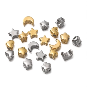 Polished gold and steel spacer beads in star, moon, and heart shapes for DIY jewelry