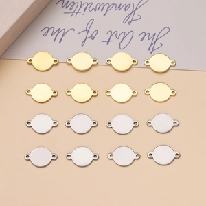 Colgantes redondos de acero inoxidable dorado y plateado con doble agujero para joyas DIY