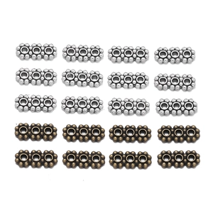 Détail de perles d'espacement à 3 trous en argent antique et bronze pour bijoux DIY
