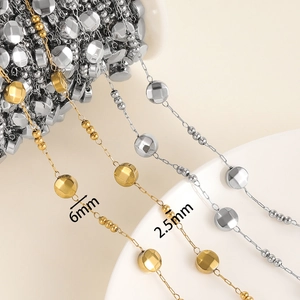 Close-up of 6mm and 2.5mm gold and silver oval bead chains for DIY jewelry making