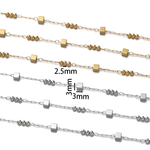 Detail of 2.5mm bead and 3mm cube stainless steel chains in gold and silver finish