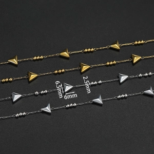 Close-up of gold and silver triangle link chains with measurements for DIY jewelry