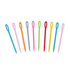 Close-up of 10 colorful plastic sewing needles with large eyes on a white background
