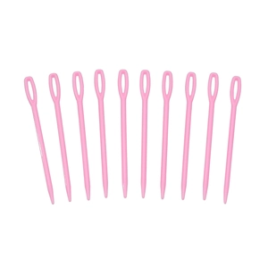 Detailed view of ten pink plastic darning needles with large eyes for yarn weaving