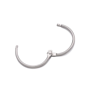 Detail of silver hinged metal binder ring with polished finish and open mechanism
