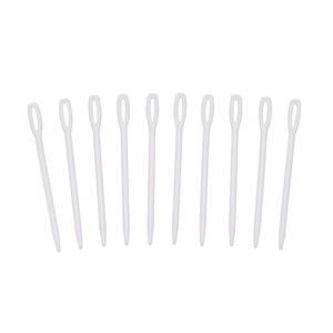 Detailed view of ten white large-eye plastic sewing needles for DIY weaving and embroidery