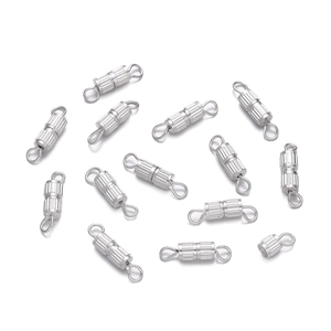 Macro shot of silver-plated copper vertical stripe screw clasps for jewelry making