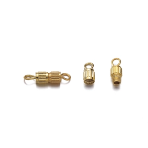 Macro view of brass screw clasps with vertical stripes for jewelry making connectors