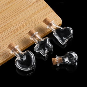 Miniature star and heart shaped clear glass wishing bottles with natural cork stoppers
