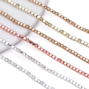 Detailed view of 2-4mm hematite cube beads in gold rose gold and silver for DIY jewelry