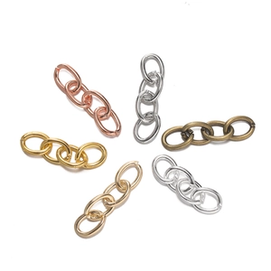 Macro view of four-link iron extension chains in six metallic finishes for DIY jewelry crafts