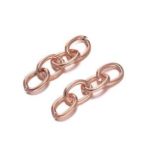 Close-up of four-link rose gold plated metal chains for DIY jewelry making