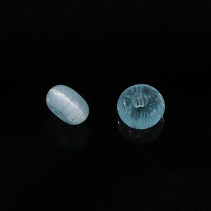 Macro shot of 2x4mm light blue cat-eye glass abacus beads for DIY jewelry making