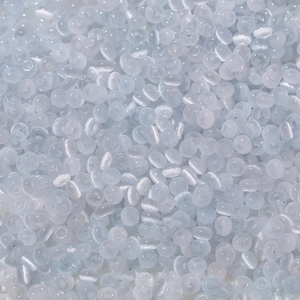 Macro view of 2x4mm light blue cat-eye glass seed beads for DIY jewelry making