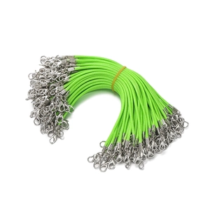 Detail of neon green 2mm waxed cord lanyards with alloy lobster clasps for DIY crafts