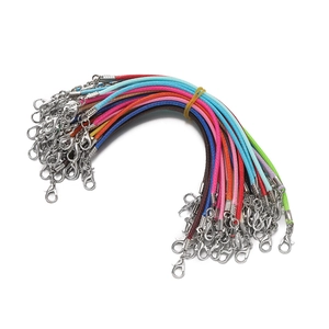 Close-up of colorful 2mm waxed cord lanyards with silver lobster clasps for DIY jewelry