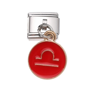 Macro detail of Italian charm link in stainless steel with red Libra zodiac enamel pendant